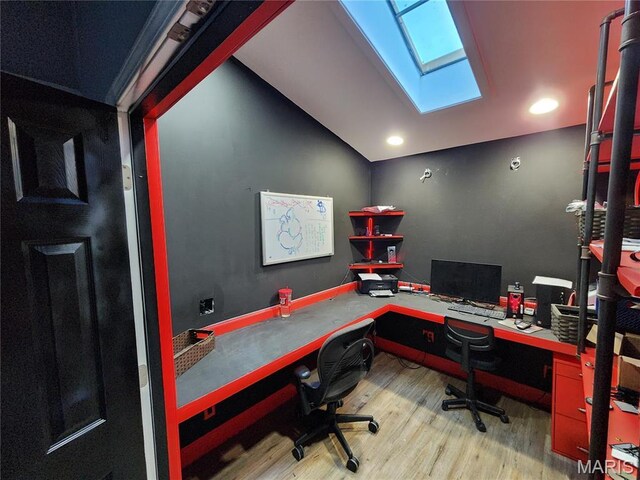 91 N Chantilly Rd, Winfield, MO 63389 - office featuring wood finished floors, a skylight, lofted ceiling, and recessed lighting