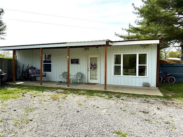 56 Berger Rd, Middletown, MO 63359 - view of front of property featuring a porch and metal roof