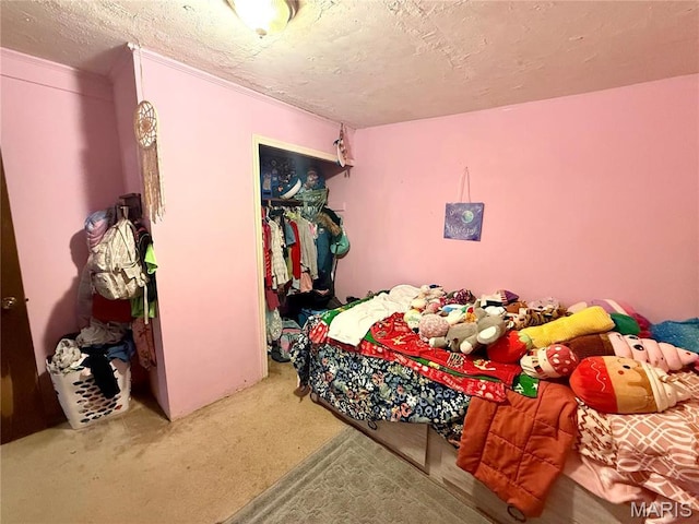 56 Berger Rd, Middletown, MO 63359 - carpeted bedroom featuring a closet and a textured ceiling