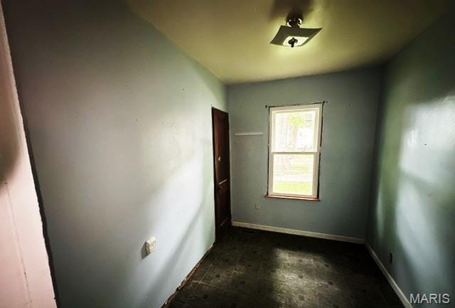 9909 Baltimore St, Belleville, IL 62223 - unfurnished bedroom featuring baseboards
