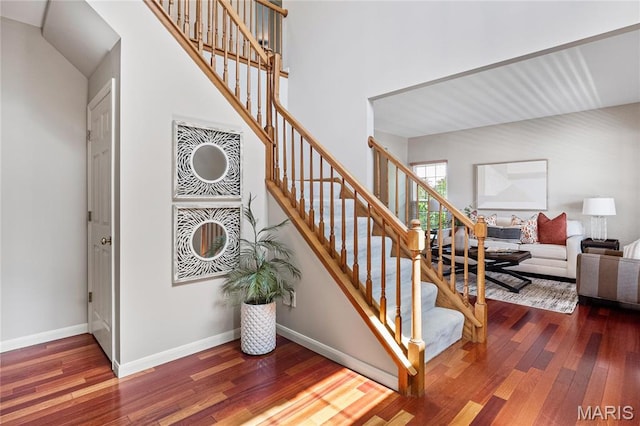 1309 Wellington Valley Ct, Chesterfield, MO 63005 - stairway with wood finished floors and baseboards