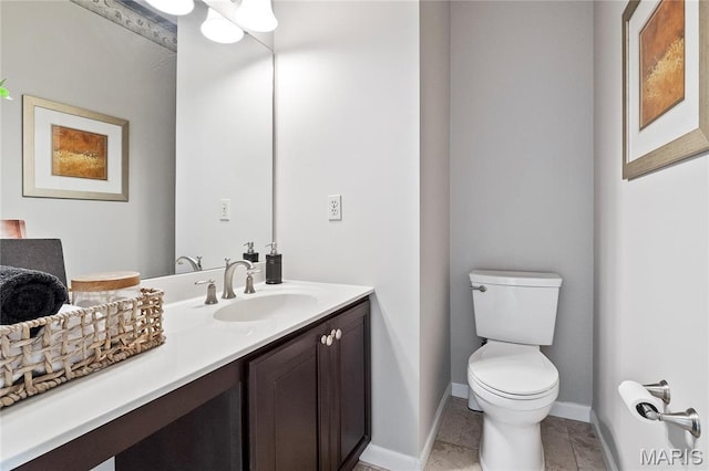1309 Wellington Valley Ct, Chesterfield, MO 63005 - half bathroom featuring toilet, vanity, baseboards, and tile patterned flooring