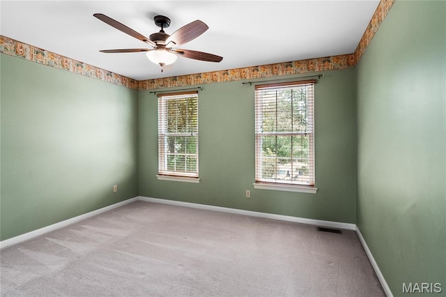 1309 Wellington Valley Ct, Chesterfield, MO 63005 - carpeted empty room featuring a ceiling fan and baseboards