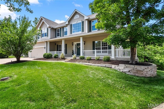 1309 Wellington Valley Ct, Chesterfield, MO 63005 - colonial house featuring a porch, an attached garage, a front lawn, and driveway