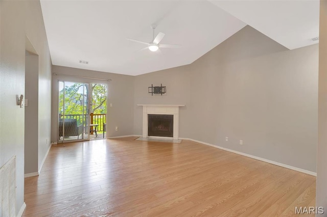 1316 Holgate Dr Unit G5, Ballwin, MO 63021 - unfurnished living room featuring a ceiling fan, light wood-type flooring, lofted ceiling, a fireplace with flush hearth, and baseboards