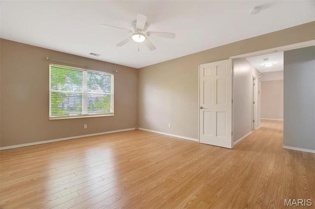 1316 Holgate Dr Unit G5, Ballwin, MO 63021 - empty room with ceiling fan, light wood finished floors, baseboards, and a smoke detector