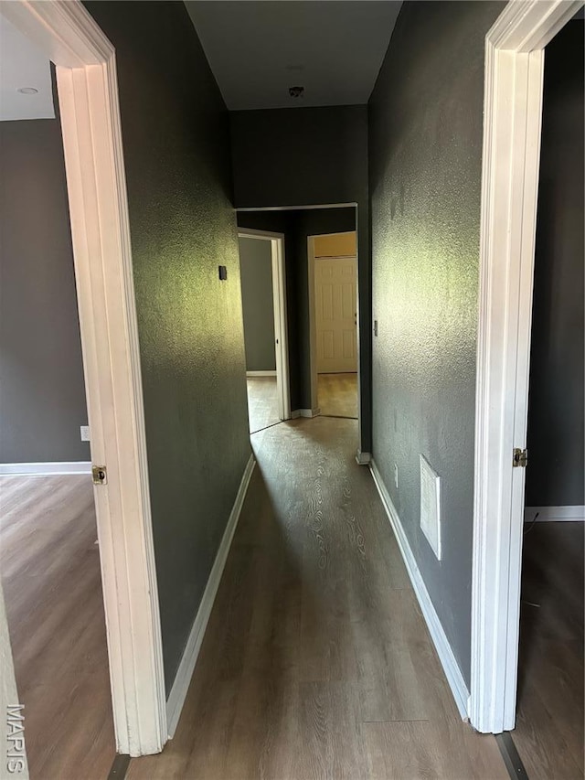 4844 Northland Ave, Saint Louis, MO 63113 - hallway featuring wood finished floors and baseboards