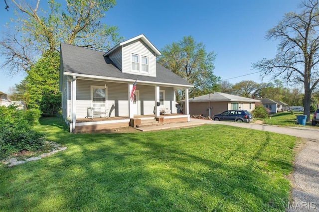 2418 Willow St, Alton, IL 62002 - bungalow-style house with covered porch and a front yard