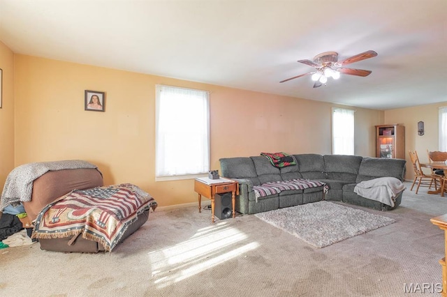 2418 Willow St, Alton, IL 62002 - living area with carpet, ceiling fan, and baseboards