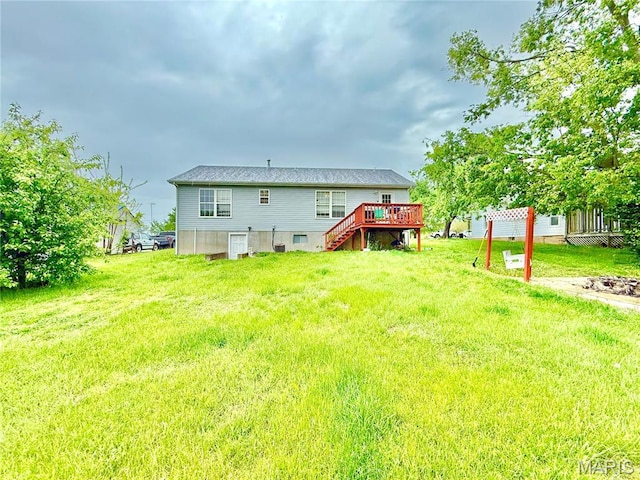 305 Houser St, Park Hills, MO 63601 - rear view of house featuring stairway, a deck, and a lawn