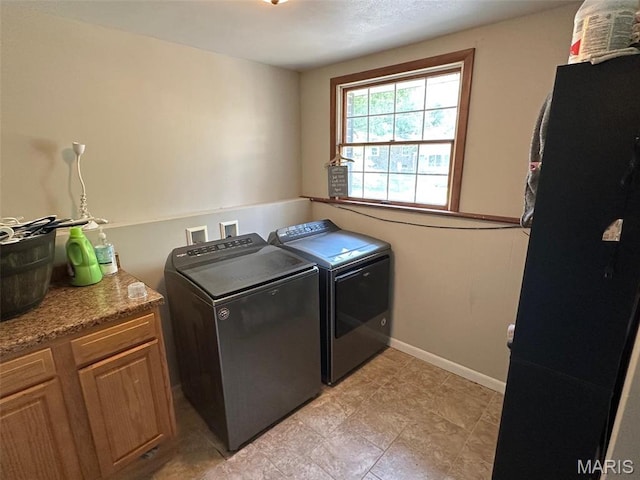 1621 Shurtleff Ct, Alton, IL 62002 - washroom with separate washer and dryer, cabinet space, and baseboards