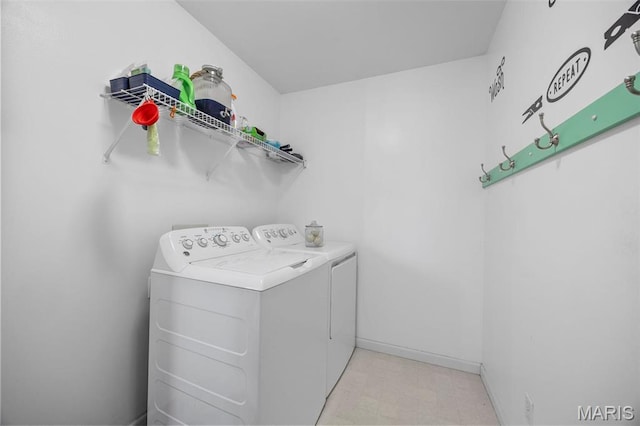 1603 Broadsword Ln, Lake St Louis, MO 63367 - washroom featuring separate washer and dryer and baseboards