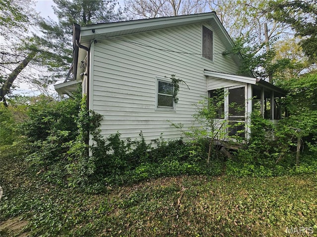 1628 Kemper Pl, Saint Louis, MO 63138 - view of side of home with a sunroom