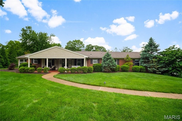 12935 Topping Estates Dr, Town And Country, MO 63131 - single story home with a front lawn, brick siding, and a porch