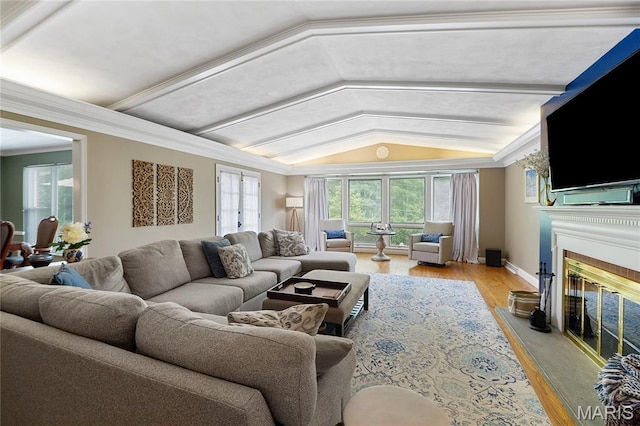 12935 Topping Estates Dr, Town And Country, MO 63131 - living area featuring vaulted ceiling, a fireplace with flush hearth, and light wood finished floors