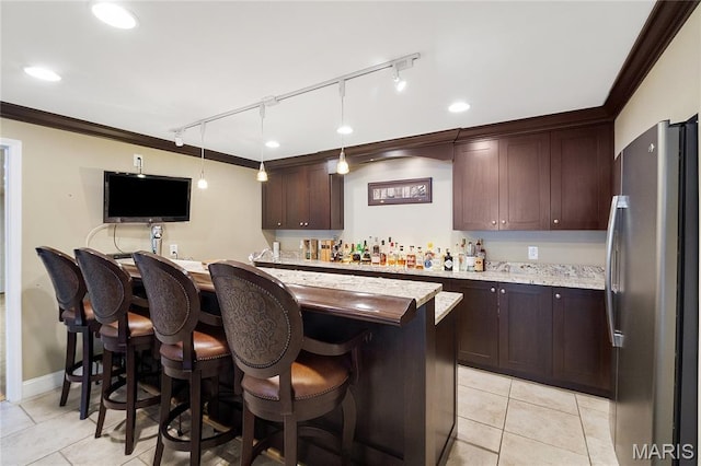 12935 Topping Estates Dr, Town And Country, MO 63131 - indoor wet bar with freestanding refrigerator, light tile patterned flooring, ornamental molding, decorative light fixtures, and rail lighting