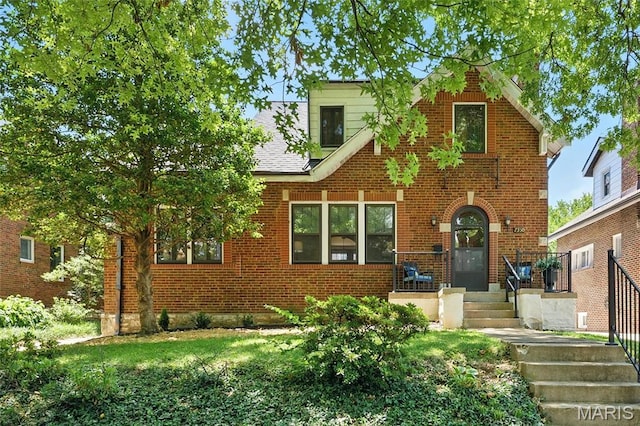 7350 Colgate Ave, University City, MO 63130 - tudor house featuring brick siding