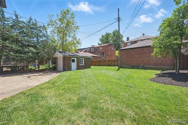 7350 Colgate Ave, University City, MO 63130 - view of yard with an outbuilding and concrete driveway