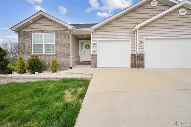 1007 Crows Nest Ct, Caseyville, IL 62232 - single story home with brick siding, driveway, and a garage