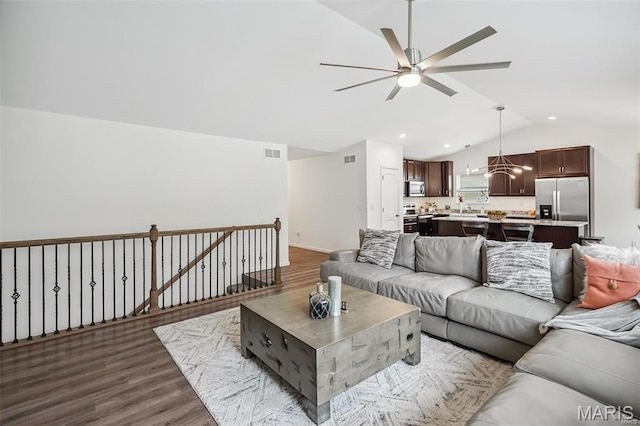 1007 Crows Nest Ct, Caseyville, IL 62232 - living room with vaulted ceiling, a ceiling fan, dark wood-style flooring, baseboards, and recessed lighting