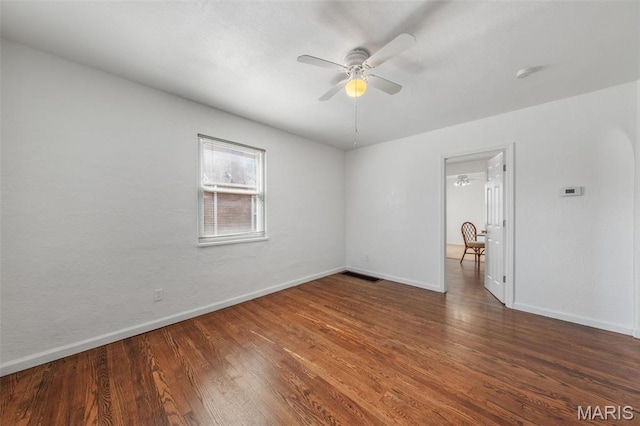 336 Tacoma Dr, Saint Louis, MO 63125 - empty room with a ceiling fan, baseboards, and wood finished floors