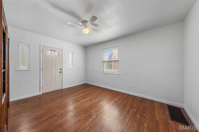336 Tacoma Dr, Saint Louis, MO 63125 - foyer entrance featuring wood finished floors, a ceiling fan, and baseboards