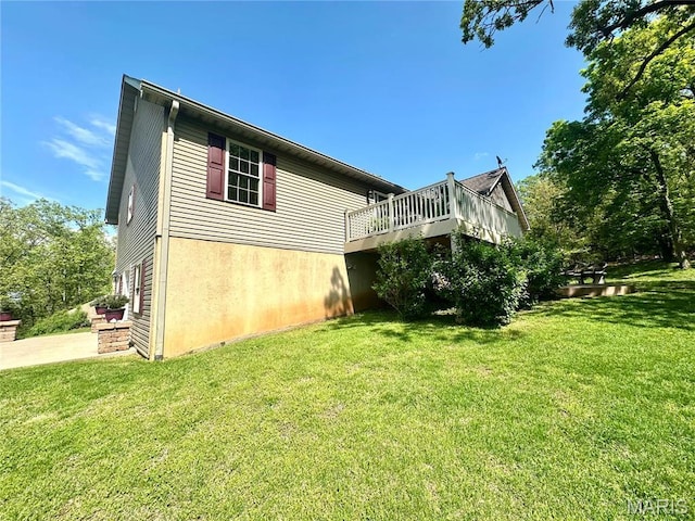 13 Montauk Ct, Leadington, MO 63601 - view of home's exterior featuring a yard and a deck