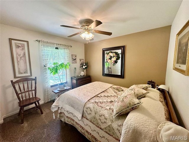 13 Montauk Ct, Leadington, MO 63601 - bedroom featuring dark carpet, baseboards, and a ceiling fan