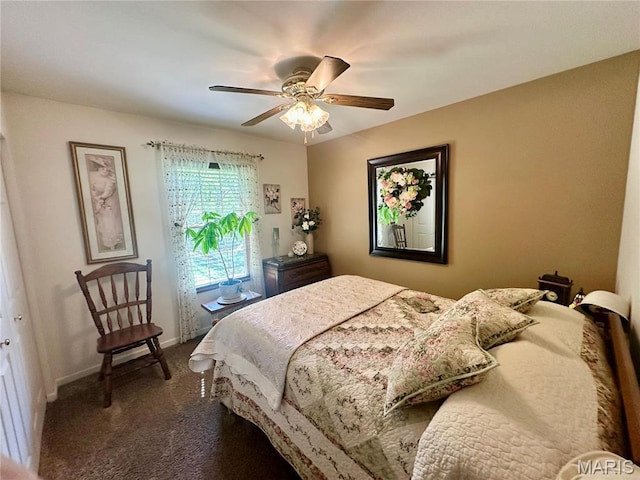 13 Montauk Ct, Leadington, MO 63601 - bedroom featuring dark colored carpet, baseboards, and a ceiling fan