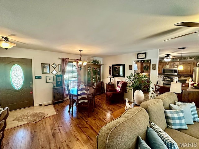 13 Montauk Ct, Leadington, MO 63601 - living room with plenty of natural light, a chandelier, light wood finished floors, and ceiling fan