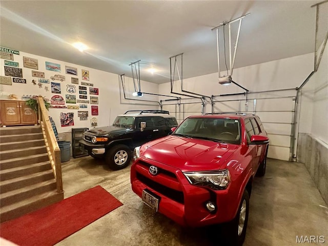 13 Montauk Ct, Leadington, MO 63601 - garage featuring a garage door opener