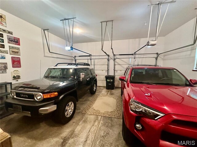 13 Montauk Ct, Leadington, MO 63601 - garage featuring a garage door opener