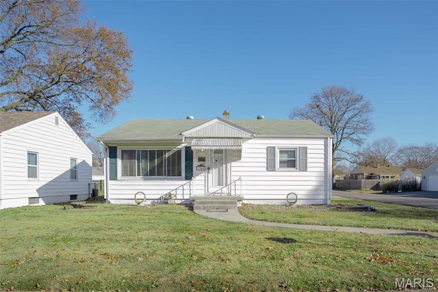 1745 Venice Ave, Granite City, IL 62040 - bungalow-style home with a front lawn and a shingled roof