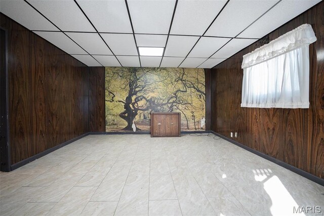 1745 Venice Ave, Granite City, IL 62040 - unfurnished room featuring wooden walls and a paneled ceiling