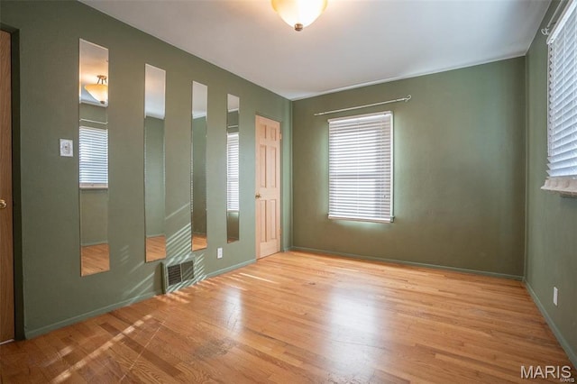 1745 Venice Ave, Granite City, IL 62040 - spare room featuring light wood-style floors and baseboards