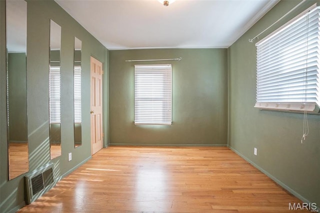 1745 Venice Ave, Granite City, IL 62040 - unfurnished bedroom featuring light wood finished floors and baseboards