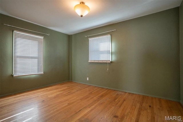1745 Venice Ave, Granite City, IL 62040 - empty room featuring wood finished floors and baseboards