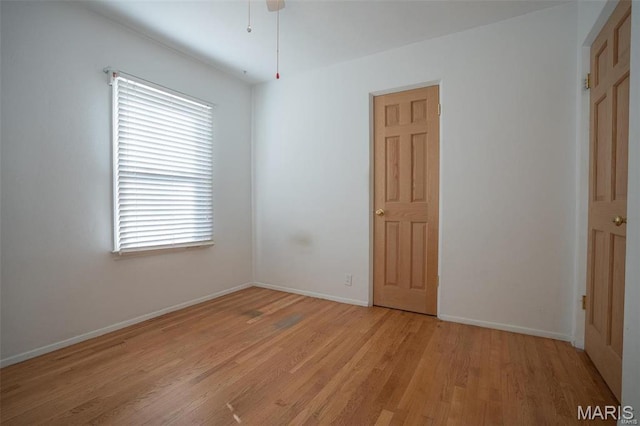 1745 Venice Ave, Granite City, IL 62040 - spare room featuring plenty of natural light, light wood-style flooring, and baseboards
