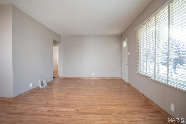1745 Venice Ave, Granite City, IL 62040 - spare room featuring light wood-style flooring and baseboards