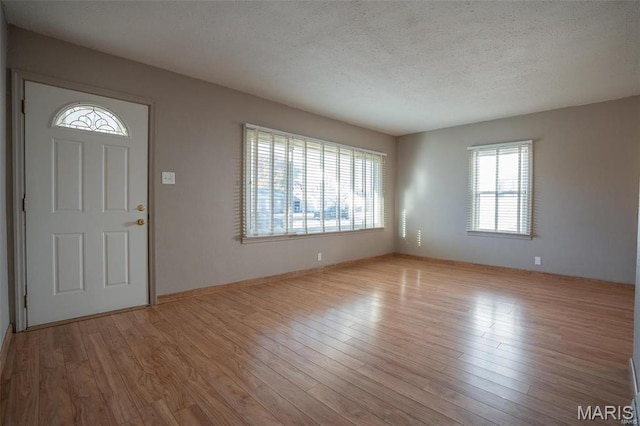 1745 Venice Ave, Granite City, IL 62040 - foyer featuring a textured ceiling and wood finished floors