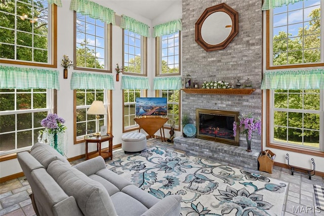 sunroom / solarium with vaulted ceiling