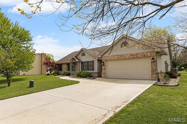 3708 Rhetts Lndg, Shiloh, IL 62221 - view of front of home with brick siding, an attached garage, driveway, and a front yard