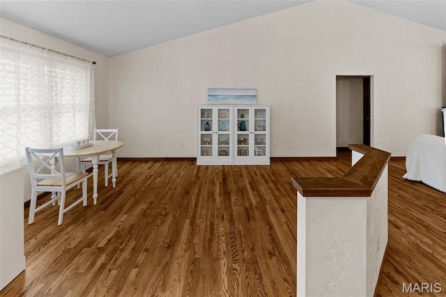 3708 Rhetts Lndg, Shiloh, IL 62221 - dining space with vaulted ceiling, wood finished floors, and baseboards