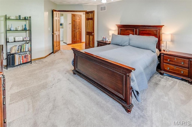 3708 Rhetts Lndg, Shiloh, IL 62221 - bedroom featuring light carpet, washer / dryer, and baseboards