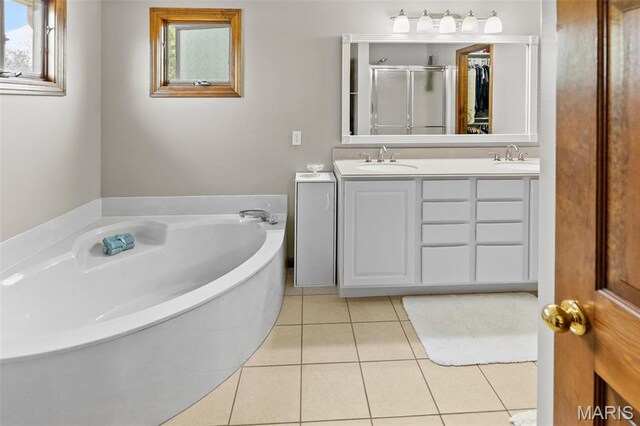 3708 Rhetts Lndg, Shiloh, IL 62221 - bathroom featuring a stall shower, a garden tub, double vanity, and tile patterned floors