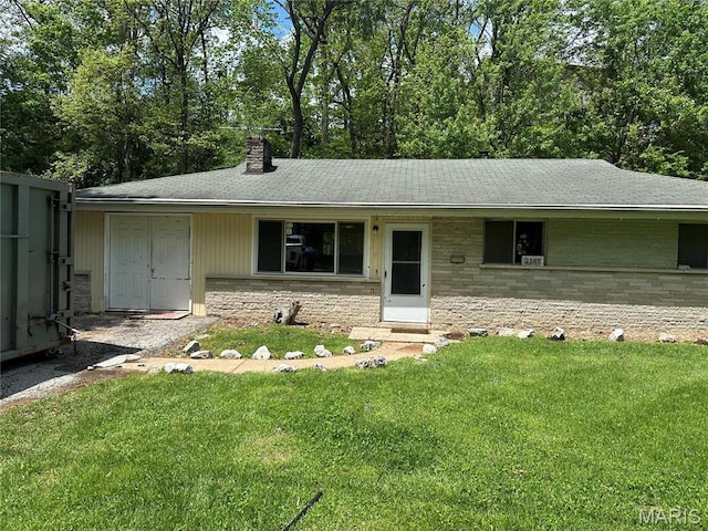 2145 Freckles Dr, High Ridge, MO 63049 - ranch-style home with a front lawn, a chimney, and stone siding