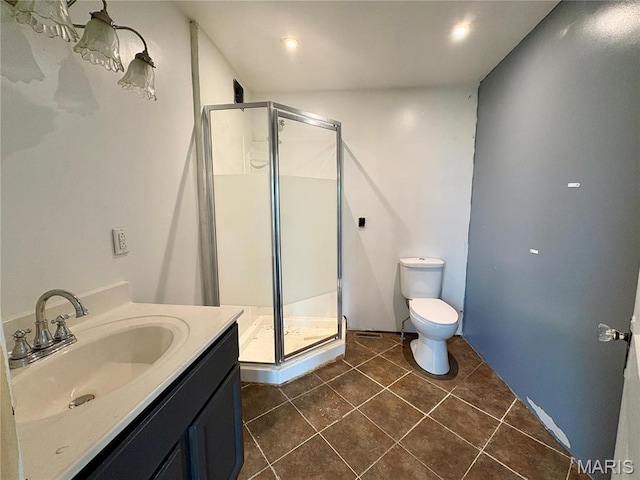 9621 Main St, Altenburg, MO 63732 - bathroom featuring a stall shower, toilet, vanity, and tile patterned floors