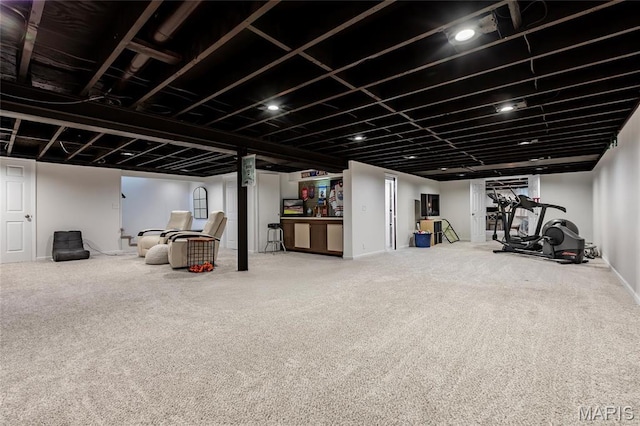 finished below grade area featuring carpet floors and baseboards