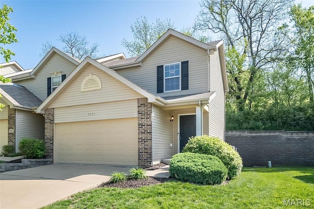 5541 Wavecrest Cir, Saint Charles, MO 63304 - view of front facade featuring brick siding, a garage, concrete driveway, and a front lawn
