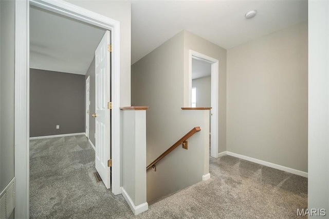 5541 Wavecrest Cir, Saint Charles, MO 63304 - hallway with an upstairs landing, carpet, and baseboards